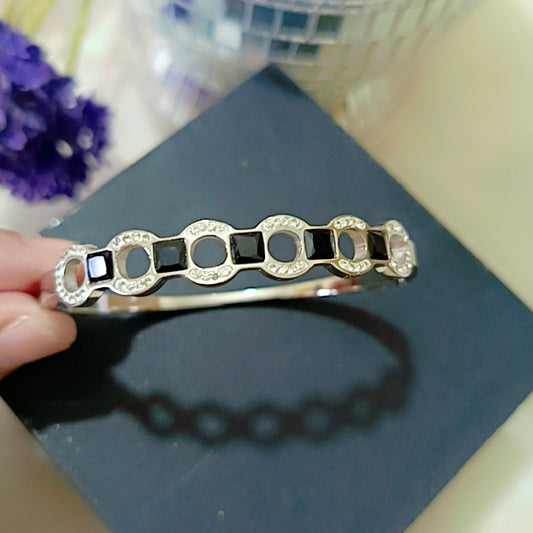 Silver stones embedded handcuff